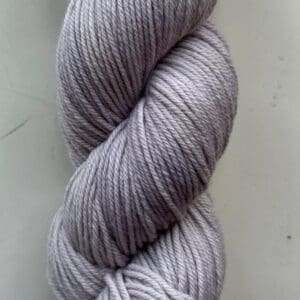 Purple Colorway: Variegated Lavender. Length: 328 yds / 300 meters/100g Variegated Lavender 100% Puma Cotton DK is our first VEGAN yarn base. Spun from 100% organic Pima cotton, this yarn is a soft option for warm-weather knits. At a utilitarian DK weight, this yarn is as easy to wear as it is to care for. You’ll love making tops, sweaters and baby gear with Blue Thistle 100% Pima Cotton yarn. Perfect for knitting or crocheting projects. Care Instructions: Hand wash in cold water with a gentle detergent made specifically for washing wool and other fine fibers or a PH-neutral, dye-free detergent. Lay flat to dry. Length: 437 yds / 400 meters. <strong>While our team hand-dyes each skein with the utmost care, natural dyes results can vary based on plant materials and fibers. Please be aware that variations in color and appearance may vary from the display image.  Naturally dyed yarns can blend color the first few washings, so please wash your yarn before use.</strong>