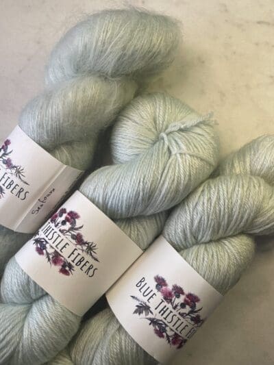 Green Colorway: Light SeaFoam. Length: 383 yards | 350 m | 100 g Our Light Seafoam eco-sock 4-Ply wool yarn is made from 50% Recycled Wool & 50% Tencel for durability.  This sustainable yarn is ethically sourced from Peru and naturally dyed in West Virginia.  This wool has a crisp, bulky feel and is perfect for apparel and other projects.  