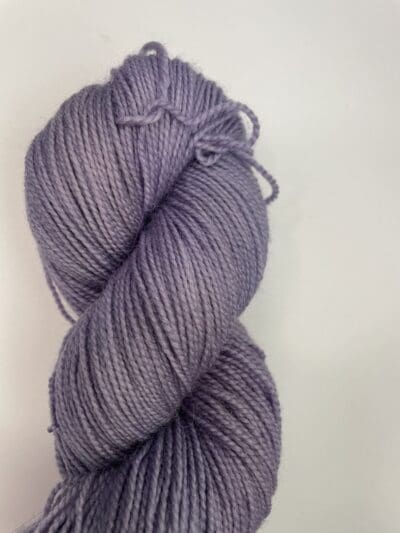 Purple Colorway: Variegated Lavender. Length: 328 yds / 300 meters/100g Variegated Lavender 100% Puma Cotton DK is our first VEGAN yarn base. Spun from 100% organic Pima cotton, this yarn is a soft option for warm-weather knits. At a utilitarian DK weight, this yarn is as easy to wear as it is to care for. You’ll love making tops, sweaters and baby gear with Blue Thistle 100% Pima Cotton yarn. Perfect for knitting or crocheting projects. Care Instructions: Hand wash in cold water with a gentle detergent made specifically for washing wool and other fine fibers or a PH-neutral, dye-free detergent. Lay flat to dry. Length: 437 yds / 400 meters. <strong>While our team hand-dyes each skein with the utmost care, natural dyes results can vary based on plant materials and fibers. Please be aware that variations in color and appearance may vary from the display image.  Naturally dyed yarns can blend color the first few washings, so please wash your yarn before use.</strong>