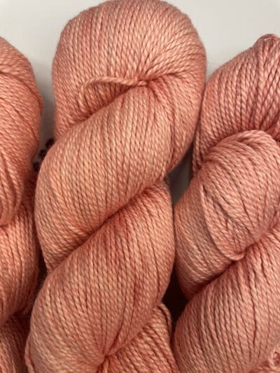 Pink Colorway: Variegated Pink. Length: 328 yds / 300 meters/100g Variegated Pink 100% Pima Cotton DK is our first VEGAN yarn base. Spun from 100% organic Pima cotton, this yarn is a soft option for warm-weather knits. At a utilitarian DK weight, this yarn is as easy to wear as it is to care for. You’ll love making tops, sweaters and baby gear with Blue Thistle 100% Pima Cotton yarn. Perfect for knitting or crocheting projects. Care Instructions: Hand wash in cold water with a gentle detergent made specifically for washing wool and other fine fibers or a PH-neutral, dye-free detergent. Lay flat to dry. Length: 437 yds / 400 meters. <strong>While our team hand-dyes each skein with the utmost care, natural dyes results can vary based on plant materials and fibers. Please be aware that variations in color and appearance may vary from the display image.  Naturally dyed yarns can blend color the first few washings, so please wash your yarn before use.</strong>